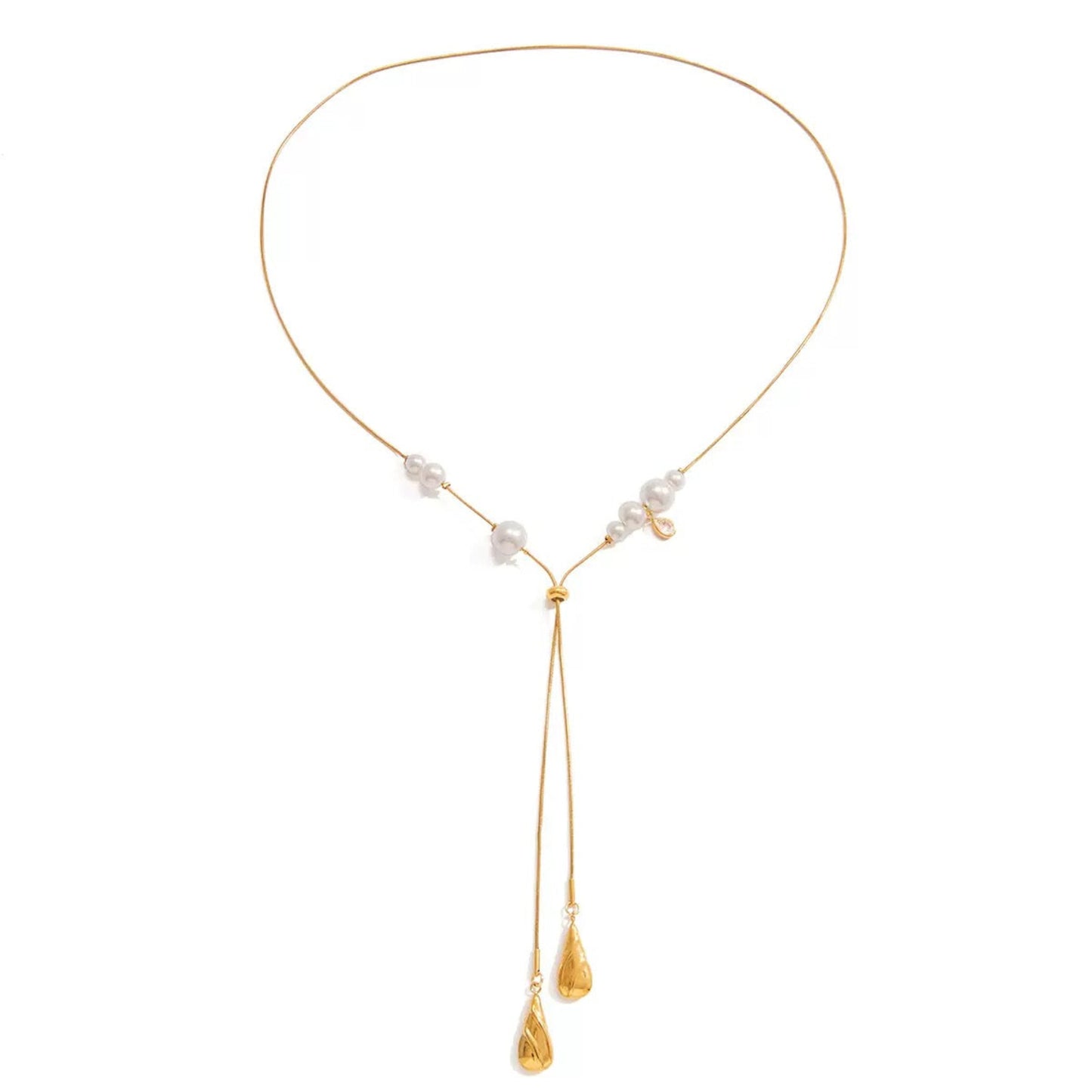 A delicate gold Y-necklace featuring three small white baroque pearls on each side of the Y-shaped junction, with two long drop chains ending in faceted gold teardrop charms, shown on a plain white background.