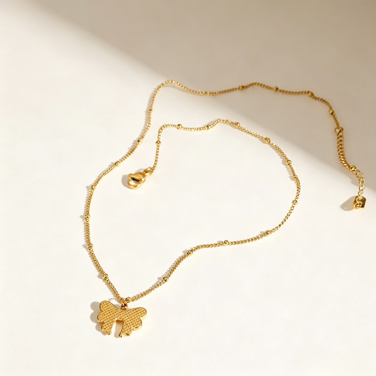 Gold Bow Pendant Necklace, Dainty Gold-Tone Ribbon Necklace for Women
