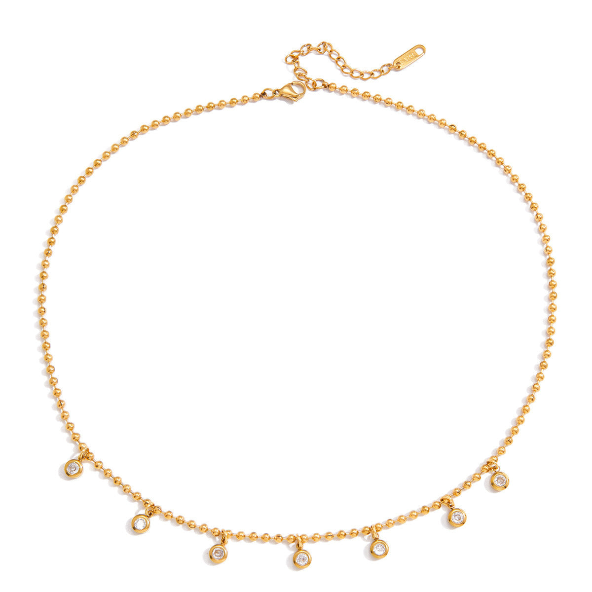 Gold necklace with small diamond-like pendants on a white background
