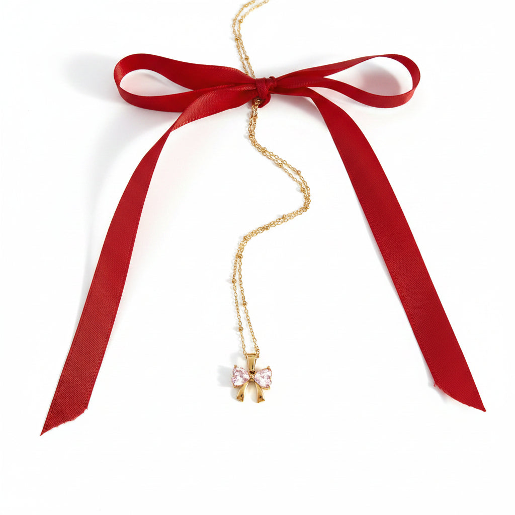 Gold - Plated Bow - Shaped Pendant Necklace with Heart - Cut CZ