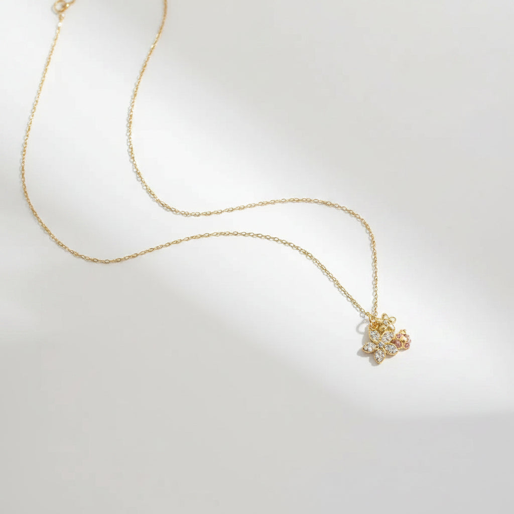 Dainty Gold Layered Necklace with Floral Pendants – Elegant Flower Charm Necklace for Women