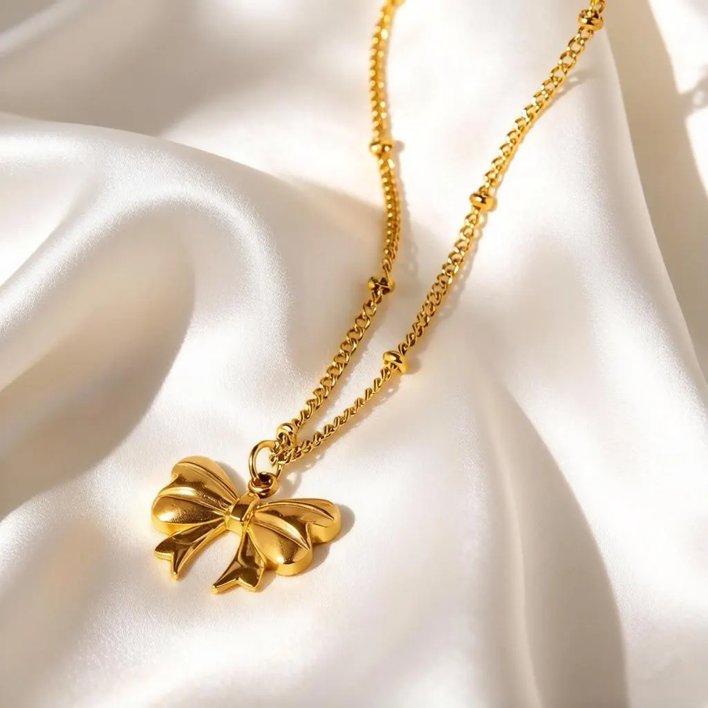 Gold Bow Pendant Necklace, Dainty Gold-Tone Ribbon Necklace for Women