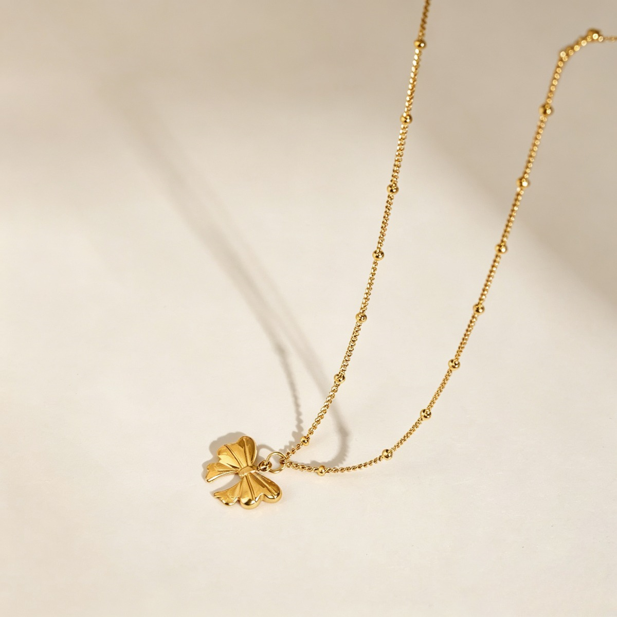 Gold Bow Pendant Necklace, Dainty Gold-Tone Ribbon Necklace for Women