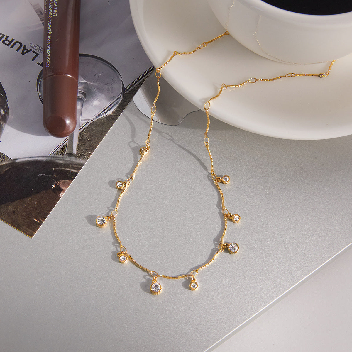 Multi - Layered Gold - Tone Necklace with CZ Pendants and Heart - Shaped Charm