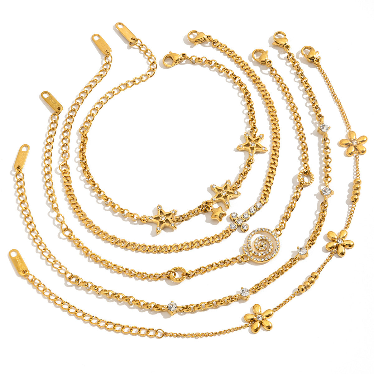 Layered Bracelet Set with Stars, Spiral Pendant, Cross Charms & Flower Charm