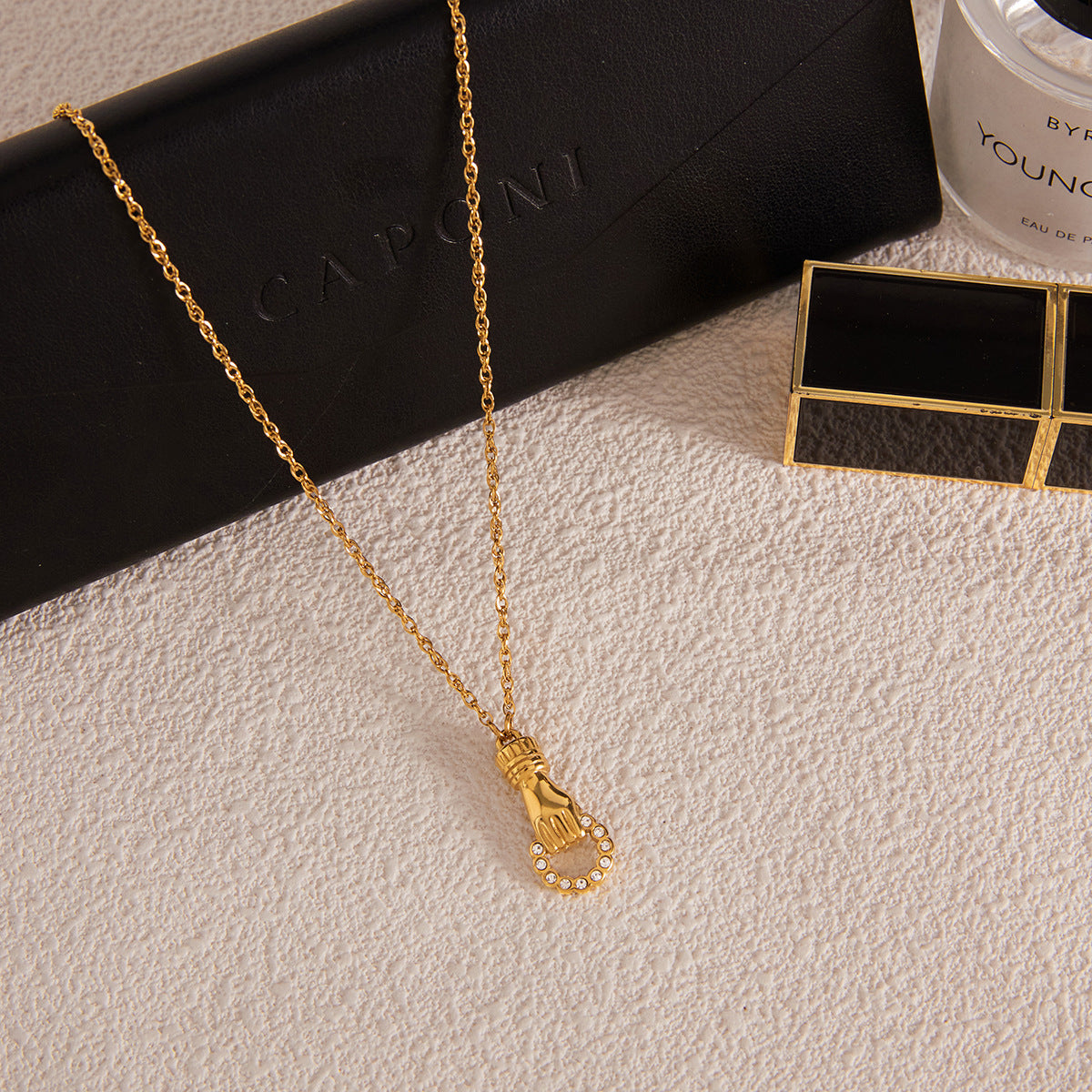 Gold - Plated Hand - Shaped Pendant Necklace with Diamond