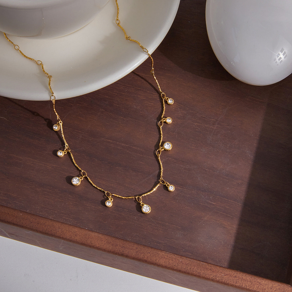 Multi - Layered Gold - Tone Necklace with CZ Pendants and Heart - Shaped Charm