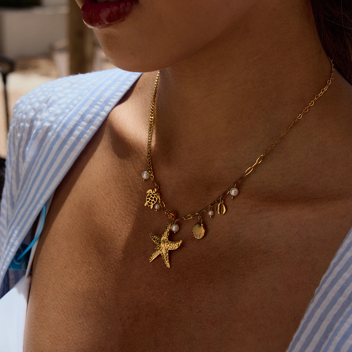 Gold - Plated Starfish Necklace with Turtle, Shell and Pearl Charms