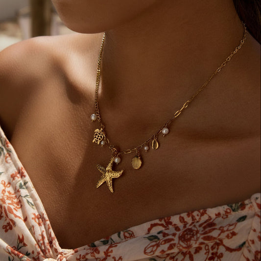 Ocean Treasure Necklace - Gold Starfish, Sea Turtle & Pearl Charm Necklace for Beach Lovers