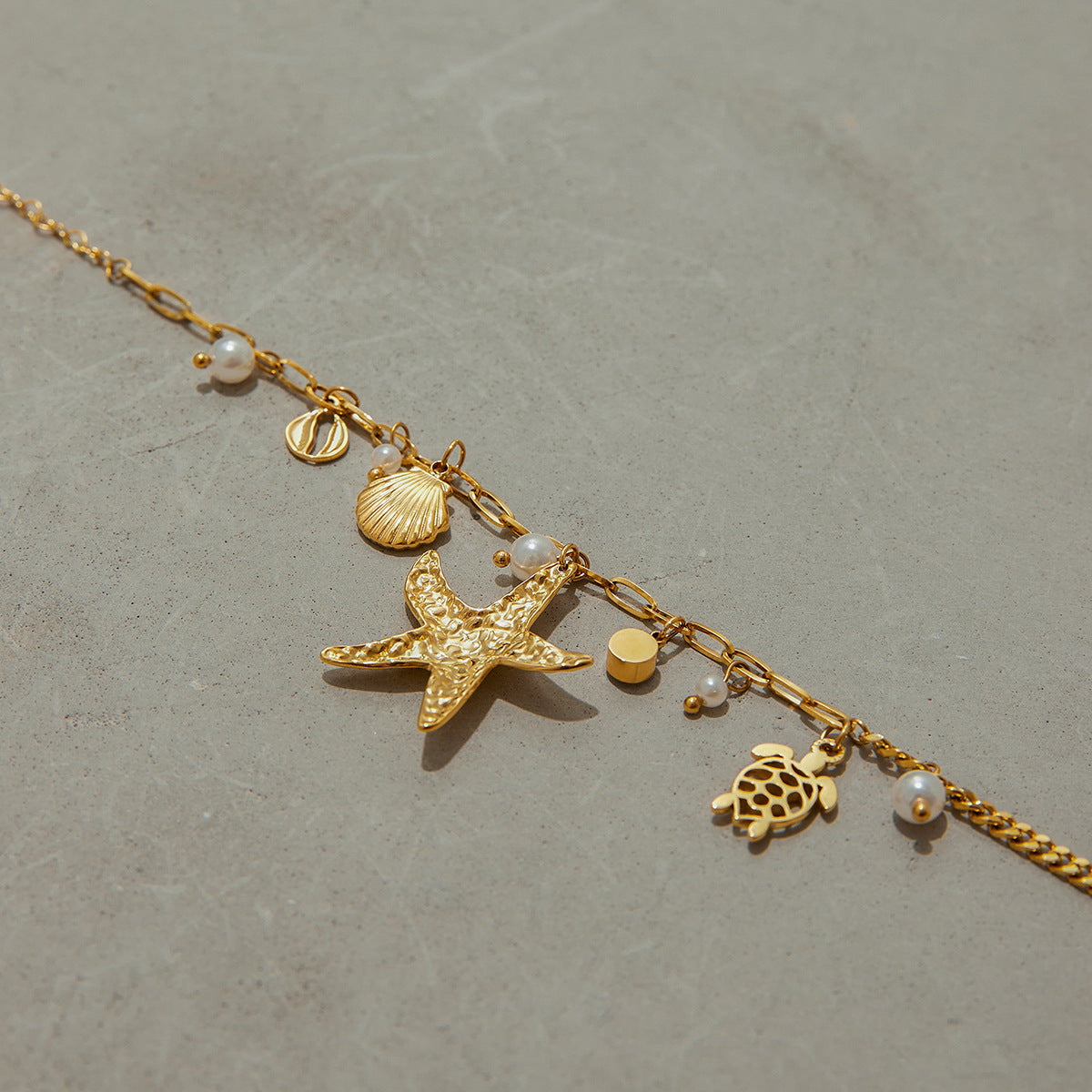 Gold - Plated Starfish Necklace with Turtle, Shell and Pearl Charms