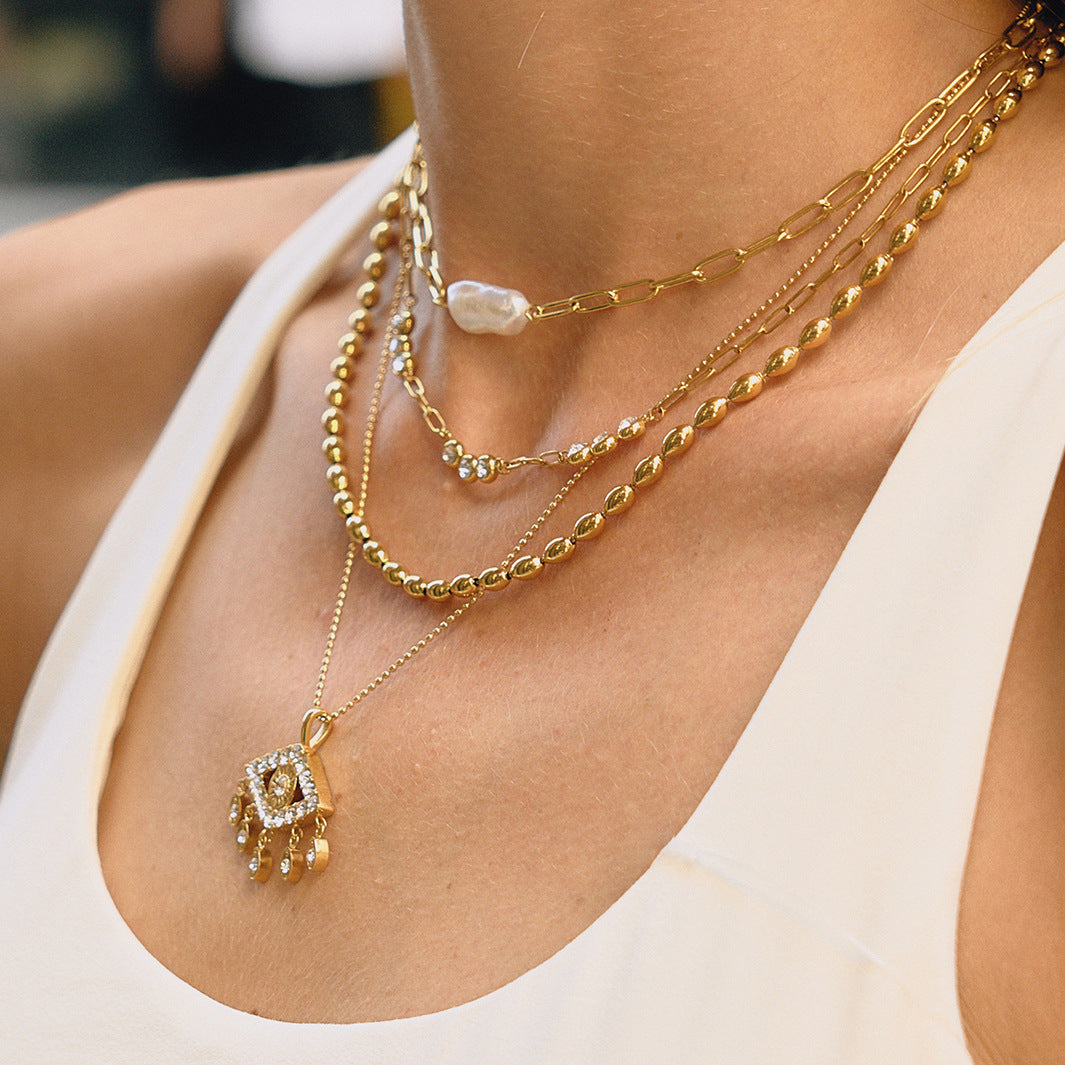 Golden Eye - Shaped Pendant Necklace with Sparkling Crystals