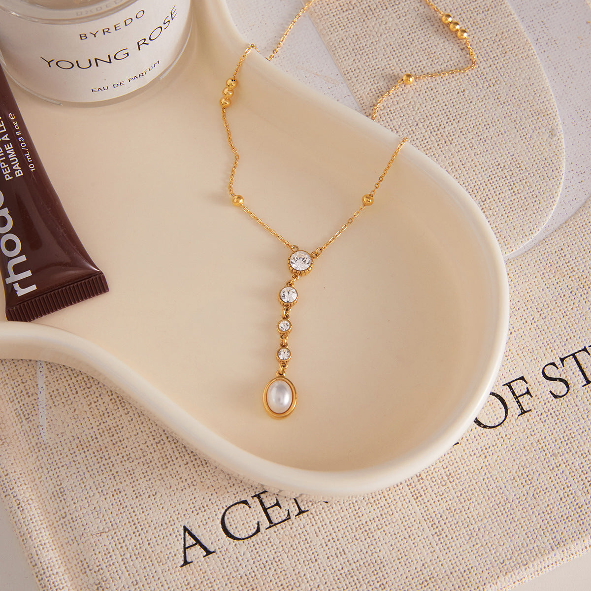 Elegant Gold - tone Y - shaped Necklace with Pearl and Crystal Drop