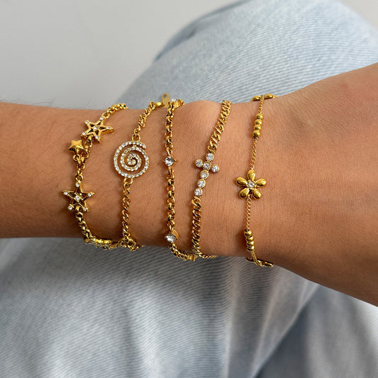 Layered Bracelet Set with Stars, Spiral Pendant, Cross Charms & Flower Charm