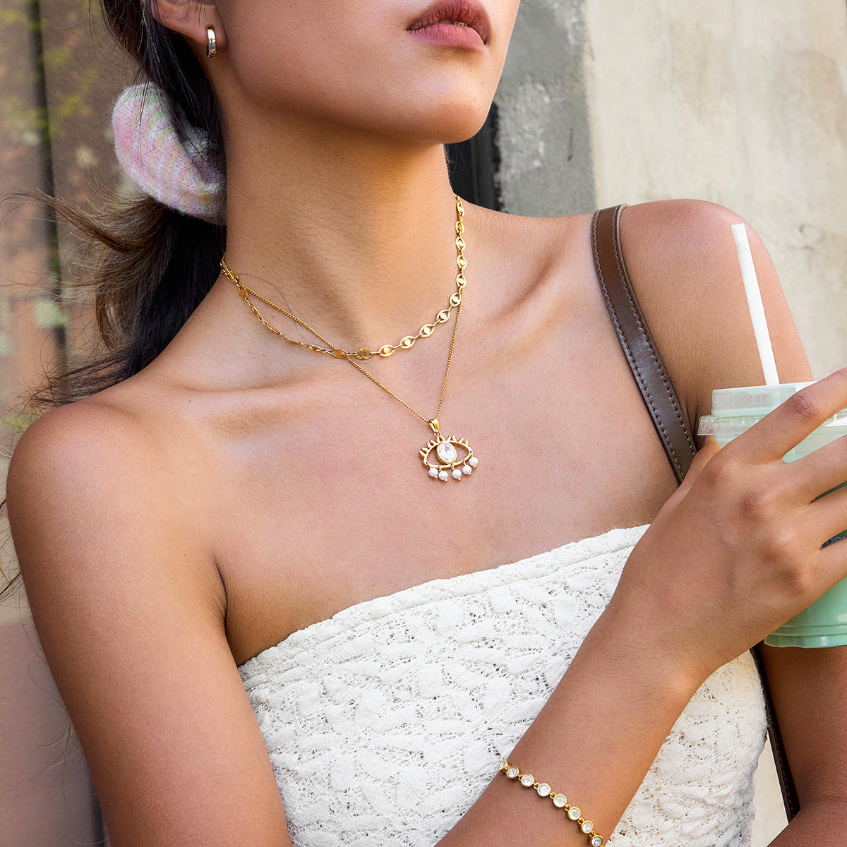 Golden Eye - shaped Pendant Necklace with Pearls