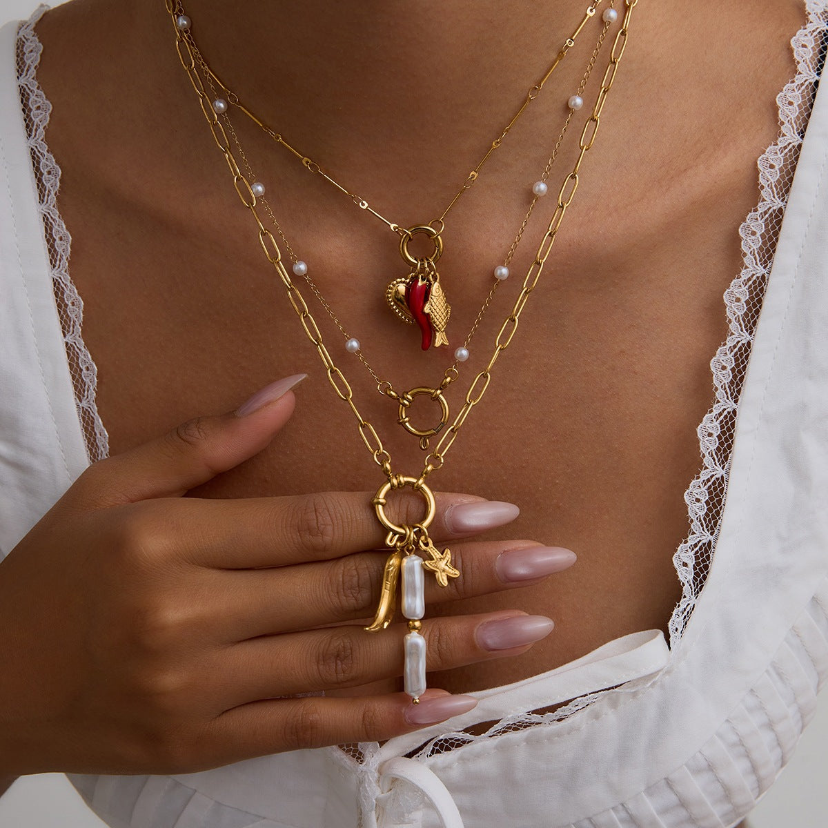 Multi - Layered Gold Necklace with Pearl and Charm Details