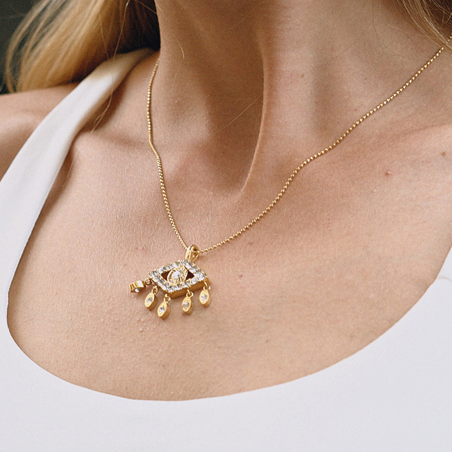 Golden Eye - Shaped Pendant Necklace with Sparkling Crystals