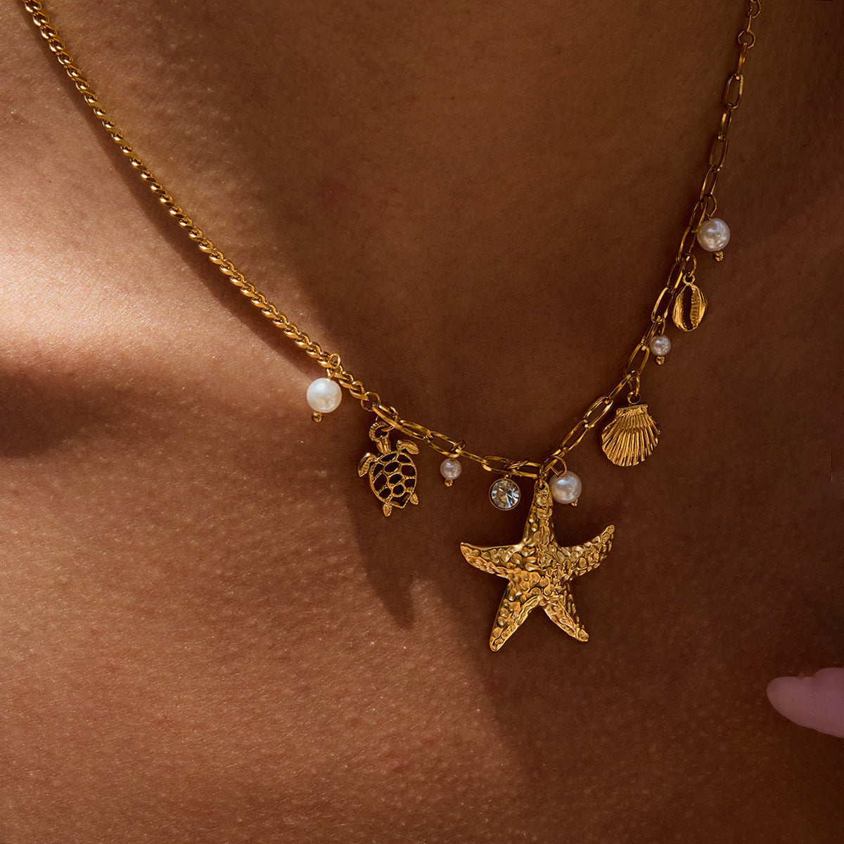 Gold - Plated Starfish Necklace with Turtle, Shell and Pearl Charms