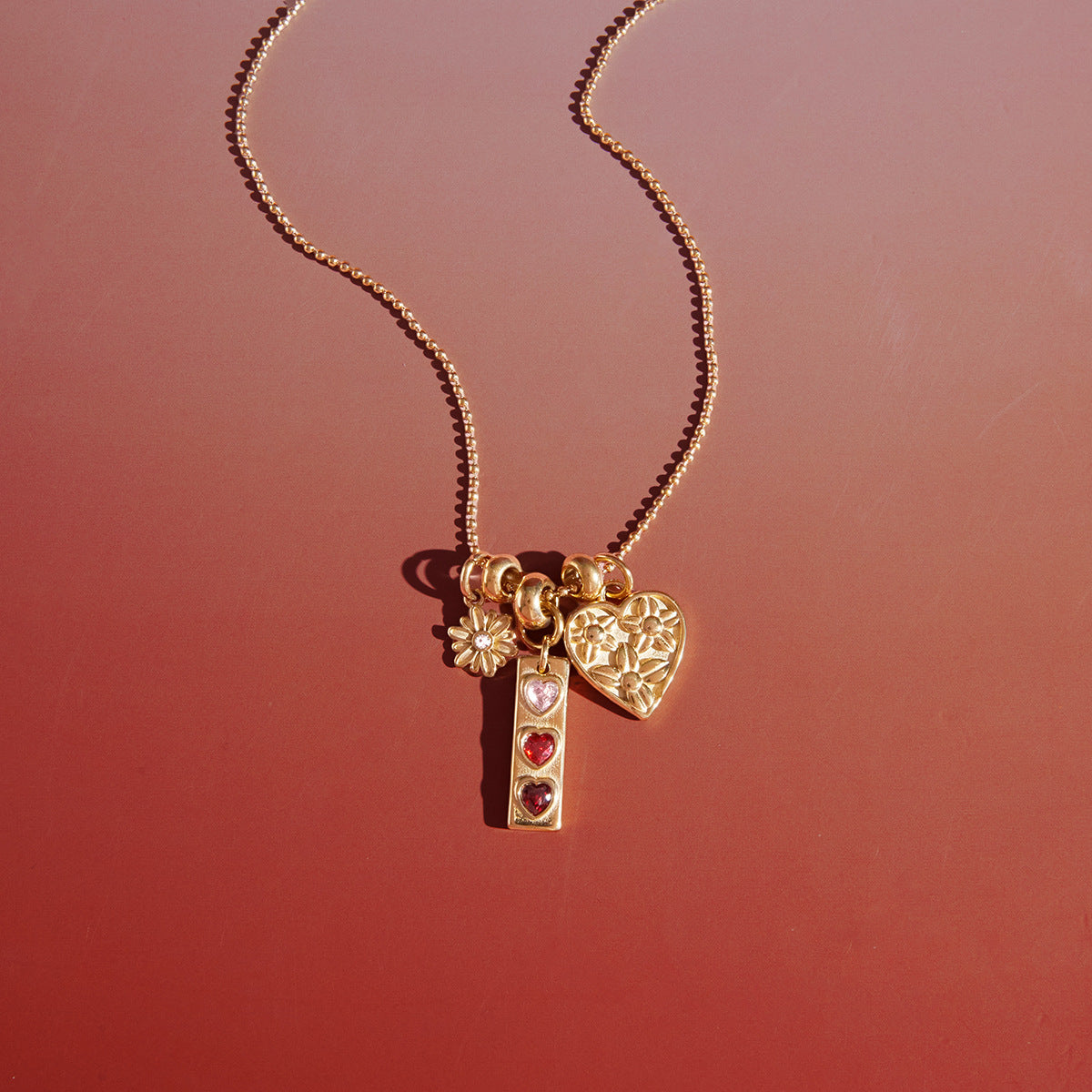 Gold - Plated Multicharm Necklace with Heart and Butterfly Charms