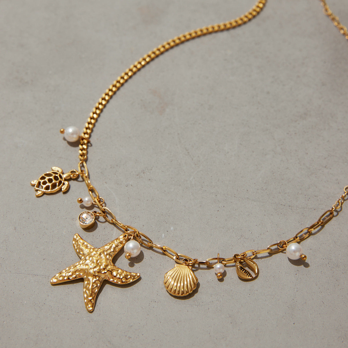 Gold - Plated Starfish Necklace with Turtle, Shell and Pearl Charms