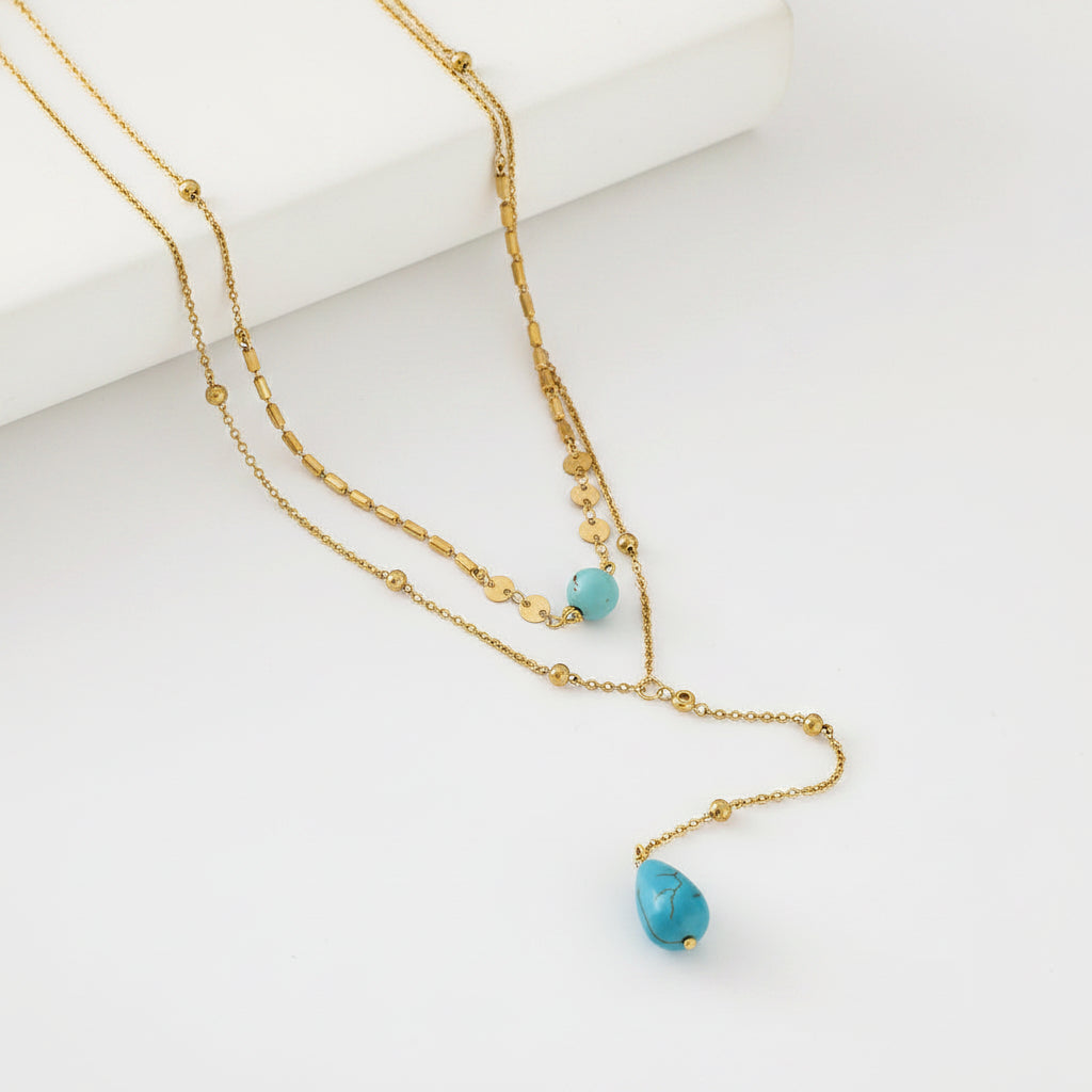 Gold necklace with turquoise beads 